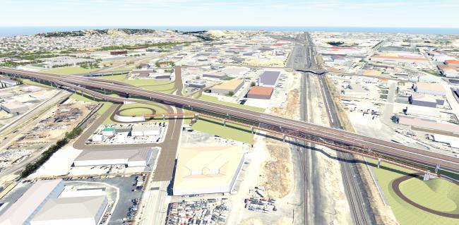 This is an aerial view of the new Wapato Way East Bridge over I-5 in Fife and the connecting SR 99 roundabout.